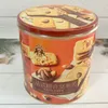 Round Tin English Assorted Cookies, French Assorted Nut Puffs, and Original Egg Rolls