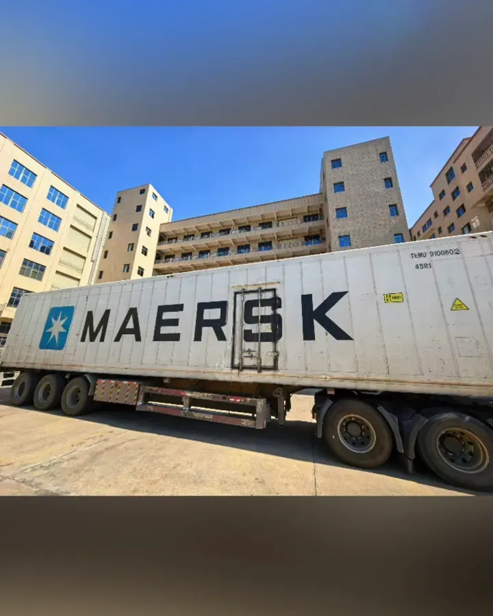Container truck outside a wholesale logistics building